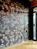 installed wall of Lichen Constellation wallpaper by artist Claire Burbridge