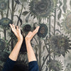 Detail of Sunflower ' Seed Heads' hand drawn luxury wallpaper design by artist Claire burbridge